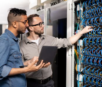 Two men working on a server