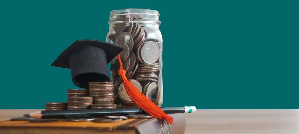 image of a jar of coins and a small graduation hat